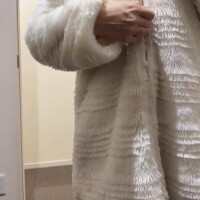 コートの下は……