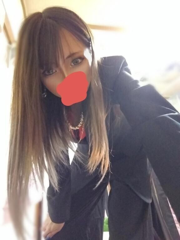 黒スーツ?